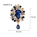 Detail view of luxury crystal brooch with size 7.5x4.5cm and weight 32g markers - Dark Blue
