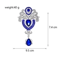 Detailed view of rhinestone brooch with size measurements 7.4cm by 9.5cm and 40g weight - Silver Royal Blue (B018-D)