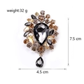 Vintage luxury crystal brooch with amber pear-shaped stone and rhinestone tassels - Smoke