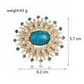 Blauwe glazen zonnestraal broche met kristallen strassteentjes en gouden metaalfinish - Goud & Blauw Sunburst Stijl (FG030-A)