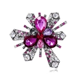 Vintage silver starburst brooch featuring large purple and pink crystal gemstones - B286-a