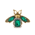 Vintage gold bee brooch with green gemstones and white zircon accents on white background - Green Gem Style (AL1308-A)