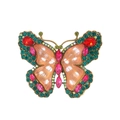 Detailopname van vintage vlinderbroche met kleurrijke kristallen en goudkleurig frame - Oranje Rood en Roze Stijl (AL1257-B)