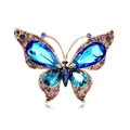Lussuosa spilla a farfalla con gemme blu e strass colorati su sfondo bianco puro - Stile Blu-Verde (AL1423-A)