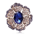 Vintage style hollow flower brooch with a large oval blue gemstone and crystal accents - Dark Blue