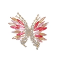 Elegante gouden vlinderbroche met vleugels van rode, roze en amber kristallen - Gradiënt Rood Roze (AL900-B)