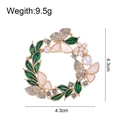 Elegant round wreath brooch with green enamel leaves, pearls, and pink butterfly accents - Butterfly Ring Floral Style (AL833-A)