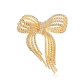 Elegant gold bow brooch with woven metal texture and natural ribbon drape effect - Gold Bow (D055-B)
