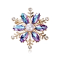 Elegant gold snowflake brooch with AB blue crystals and white pearl center on white background - Blue-Purple Gradient Style (C235-A)