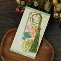 Detail of hollow metal bookmark with koi fish motifs and elegant dark green silk tassel - Koi Lotus Style (T01042521)