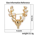 Golden reindeer head brooch with pearls showing 4.7cm by 4.2cm size measurements - Gold (XZ25282)