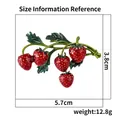 Size chart for strawberry brooch measuring 5.7cm by 3.8cm with weight information - Red Strawberry Cluster Style (XZ25295)