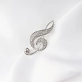 Sparkling treble clef brooch with silver finish and crystal rhinestones on white silk - Silver-Tone Treble Clef Musical Note Style (TS Note)