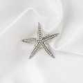 Elegant silver starfish brooch with white faux pearls on white silk background - Silver Small Starfish with Artificial Pearl (TS)