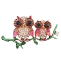 Vintage gold owl brooch with white crystals and pink enamel on a green branch - Two Owls