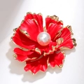 Detail of red enamel flower brooch with golden edges and a large white pearl center - Large Red Floral (XZ156)