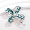 Silver four-leaf clover brooch with emerald green and AB crystals on white background - Silver with Emerald and AB Rhinestones (XZ175)