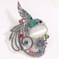 Spilla fenice vintage in argento con strass colorati e una pietra occhio di gatto bianca - Vintage Silver Green