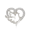 Detail of silver heart brooch with sparkling rhinestones and a white dove silhouette - Silver