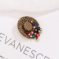 Spilla vintage a cappello di paglia con strass colorati e finitura oro su carta - Oro Antico Marrone