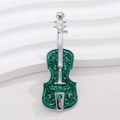Elegante zilveren vioolbroche met smaragdgroen emaille en opengewerkte bloemmotieven - Zilveren Frame Groene Viool