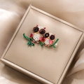 Detail of owl brooch with rhinestones and green enamel branch in a gold jewelry box - Vintage Double Owls on Branch Style (XZ20-009 Owl)