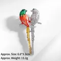 Detail view of bird brooch with rhinestones and enamel, size 6.6x3.2cm, weight 13.2g - Double Birds on Branch (XZ24094)