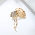 Elegant gold ginkgo leaf brooch featuring pavé crystals and hollow-out artistic design - Ginkgo Leaf (XZ20-002)