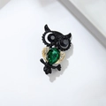 Broche hibou vintage avec cristal émeraude en goutte et finition noire mate chic - Hibou en Strass (XZ24038)