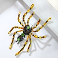 Broche araignée vintage avec rayures jaunes-noires et incrustations de cristal vert - Forme d'Araignée (XZ24005)