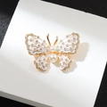 Elegant gold butterfly brooch with cream translucent wings, rhinestones, and pearls - White Butterfly (XZ25107)
