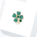 Golden clover brooch with emerald green rhinestones on white platform base - Green Four-Leaf Clover Style (Bonus 10)