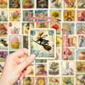 Vintage rabbit stamp sticker with broomstick illustration measuring 1.75 by 1.96 inches - Retro Postage Stamp Style (T01042461)