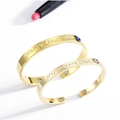 Polished gold C-shape couple bracelets with Her King His Queen engraving and magnets - His Queen And Her King Style / Gold Couple Set