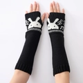 Black knitted arm warmers with white rabbit and musical notes for autumn and winter wear - Black