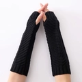 Knitted black arm warmers with cable stitch pattern and thumb holes for winter - Black