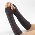 Detail of dark brown knitted fingerless gloves with geometric texture and ribbed cuffs - Dark Gray