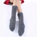 Detailed view of warm winter knit socks featuring stylish grey faux fur trim - One Size / Light Heather Gray