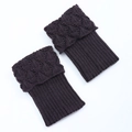 Detail of dark purple knitted leg warmers with diamond pattern and ribbed texture - One Size / Dark Gray