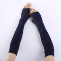 Detail of dark blue knit fingerless gloves showing long arm sleeve and rib texture - Navy Blue