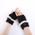 Women's black knit fingerless gloves featuring white lace trim and a wood button detail - One Size / Black