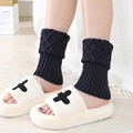 Diamond pattern black knitted leg warmers paired with white plush cross slippers - Navy Blue