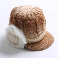 Detailed macro view of camel knit beanie featuring SMB patch and short visor - Khaki