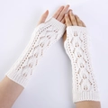 White knitted fingerless arm warmers with hollow leaf pattern and wave weave design - White
