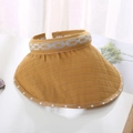 Close-up of yellow sun visor featuring ribbed fabric, silver embroidery and white dots - One Size / Ginger Yellow