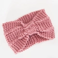 Pink chunky knit headband for women with a classic twist knot design and soft texture - Pink