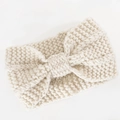 Winter cream white knitted headband for women with cozy thick yarn and bow detail - Beige