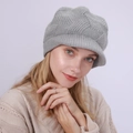 Detail showing grey knit twill pattern and soft fleece lining of the winter peaked hat - One Size / Light Gray