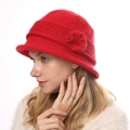 Detailed texture of red thick knit flower bucket hat with warm faux fur finish - One Size / Red