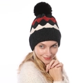 Detailed close-up of warm winter knit beanie with thick fleece lining and wave patterns - One Size / Black